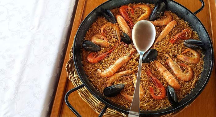 Saborea una deliciosa Paella, Fideuá o Arroz Caldoso + 2 Bebidas en Mar de Torres